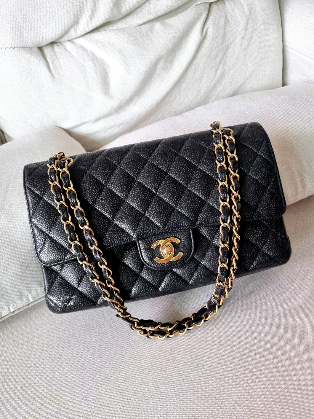 Chanel Medium Classic Flap Black Caviar 24k Gold