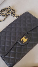 Load and play video in Gallery viewer, Chanel Jumbo Single Flap Black Caviar 24k Gold
